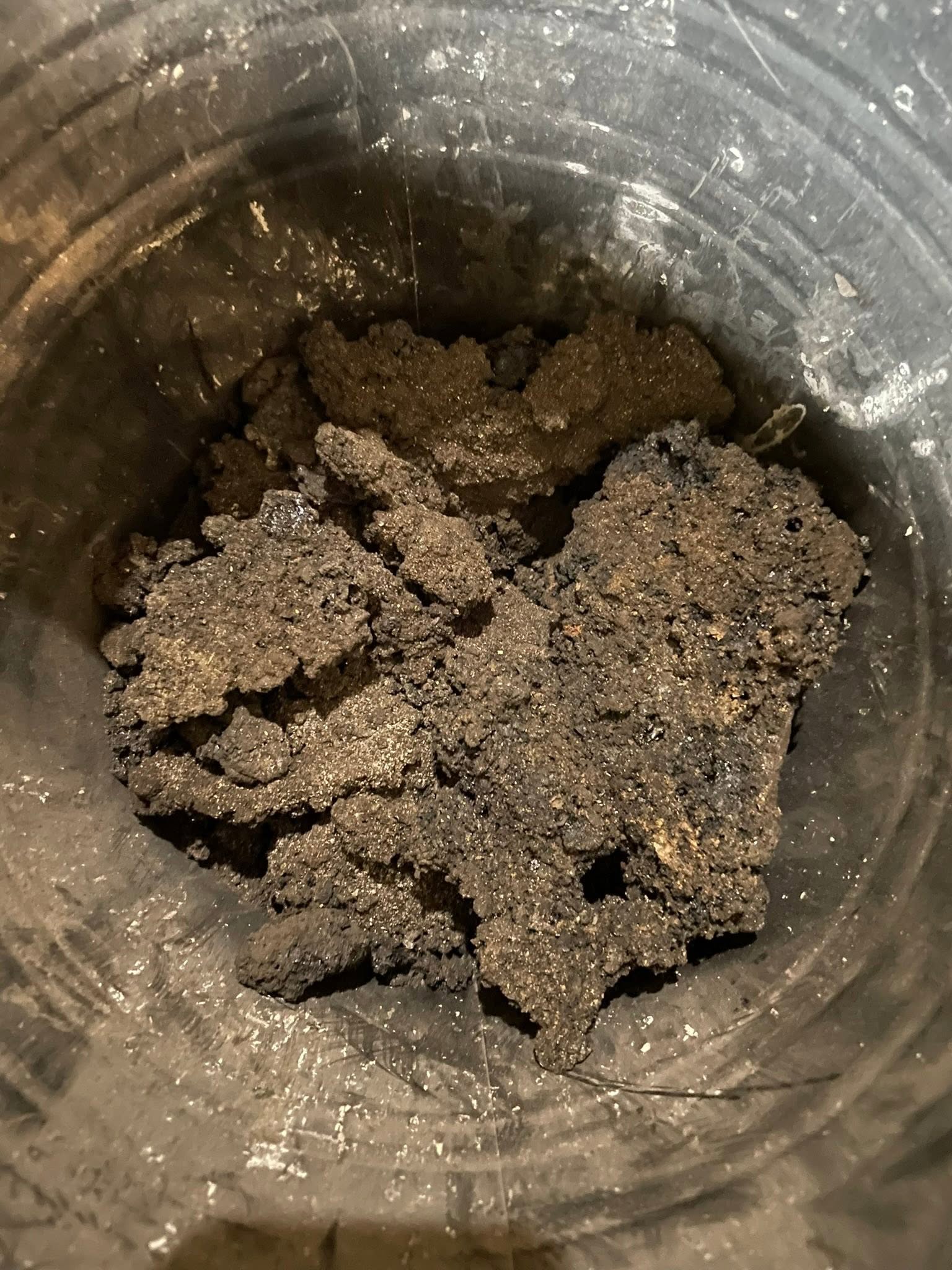 Chunks of soot and tar collected in the vacuum drum
